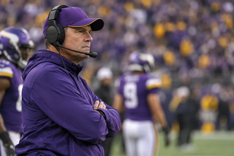 Vikings head coach watching from the sideline